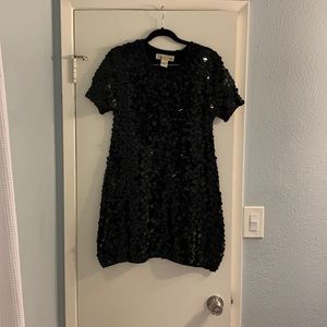 Super cute mini-sequined sweater dress.